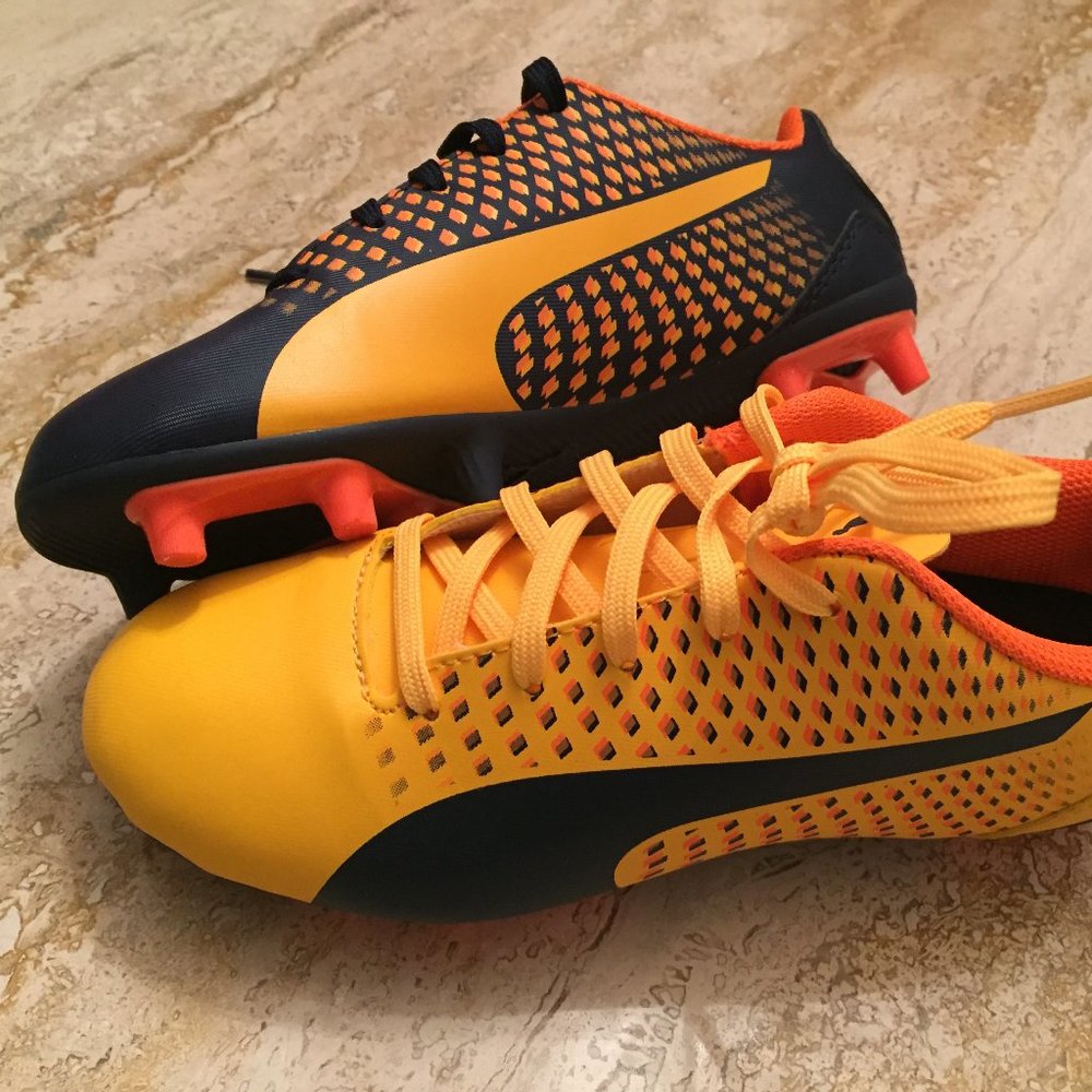 Brand new Puma boys soccer cleats
